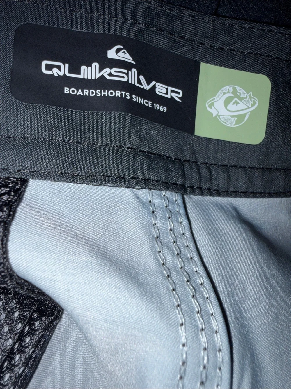 Quiksilver Men’s Black Boardshorts with Coral-to-Teal Gradient Panels